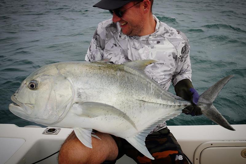 A solid GT plucked from beneath a tuna school with Tri from Fraser Guided Fishing photo copyright Fisho's Tackle World taken at  and featuring the Environment class