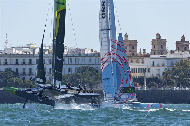 Australia SailGP Team helmed by Tom Slingsby and Great Britain SailGP Team helmed by Ben Ainslie in action on Race Day 1 of the Spain Sail Grand Prix in Cadiz, Andalusia, Spain. 24th September photo copyright Ian Walton for SailGP taken at  and featuring the F50 class