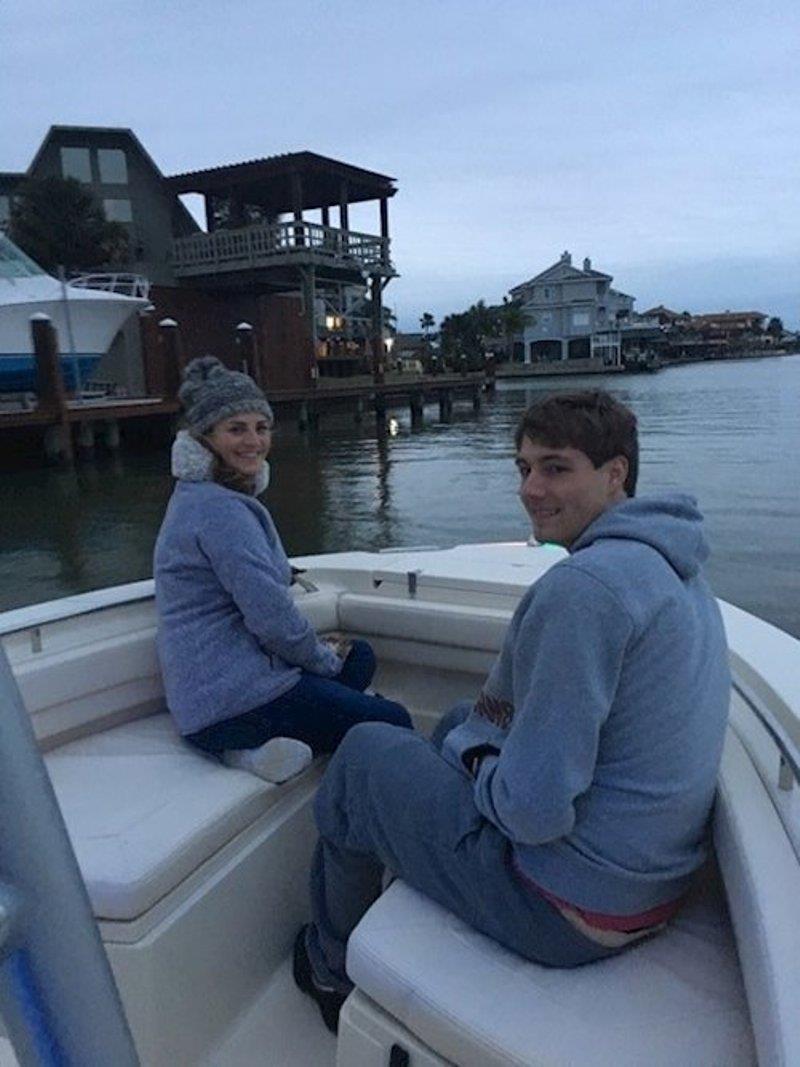 The Shields' nephew, Jon, is happy to be on the boat with Leigh, even when the weather is a little chilly! photo copyright Grady-White taken at  and featuring the Fishing boat class