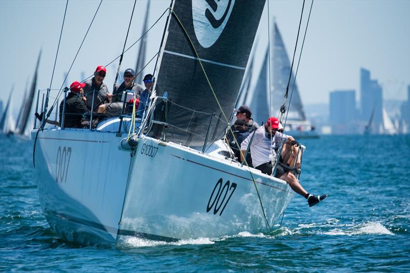 Line honours winner Extasea with the Melbourne skyline in the background during the 2020 ORCV Cock of the Bay Race photo copyright Michael Currie taken at Ocean Racing Club of Victoria and featuring the IRC class