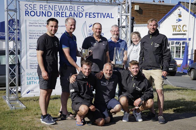 SL Energies Groupe Fastwave skipper Laurent Charmy and crew with their trophies at Wicklow Sailing Club after winning the SSE Renewables Round Ireland Race photo copyright David Branigan / Oceansport taken at Wicklow Sailing Club and featuring the IRC class
