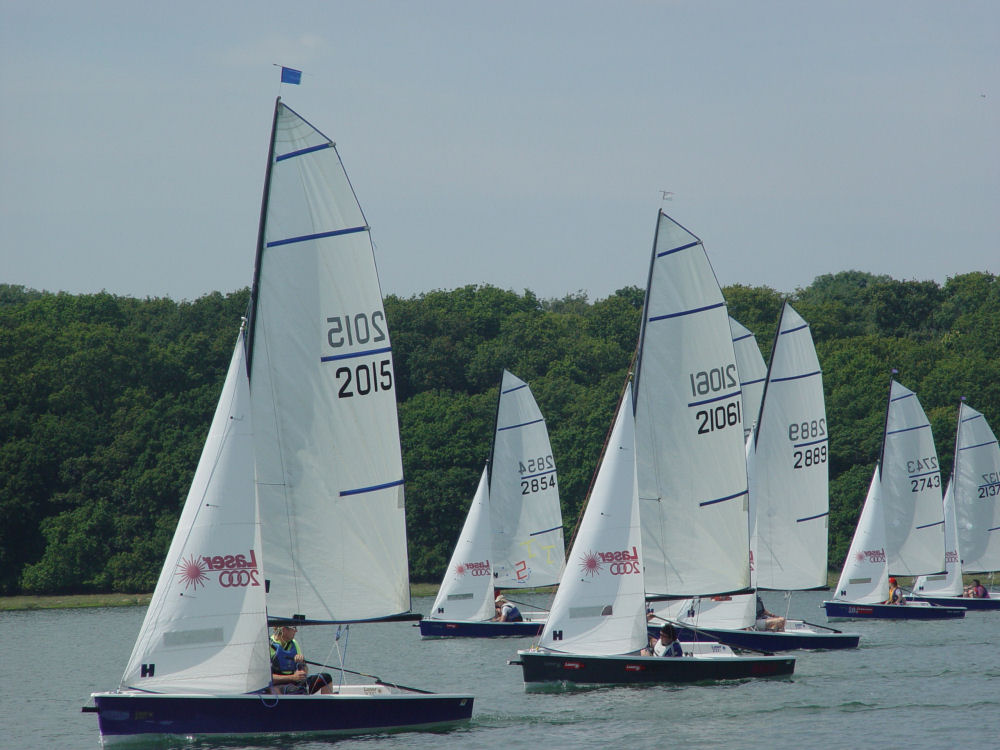 Laser 2000s at the Chichester Asymmetric open photo copyright Tony Purser taken at Chichester Yacht Club and featuring the 2000 class