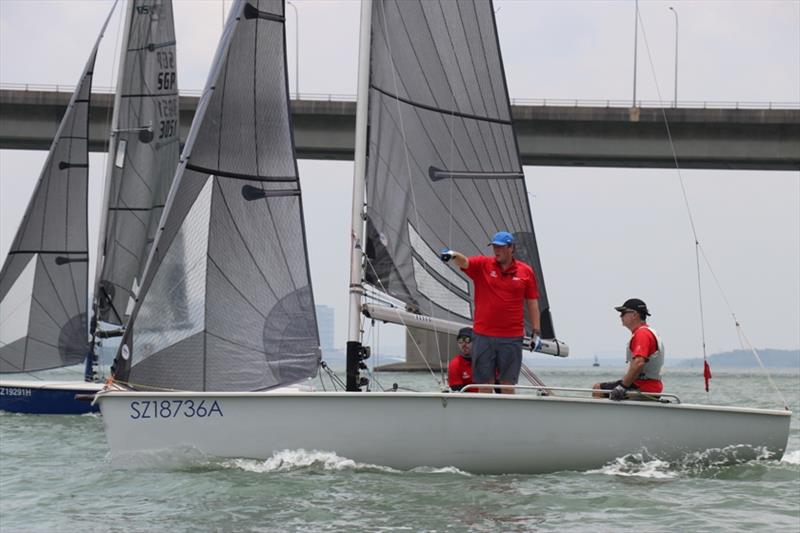 Team Tara planning their route for the first race - SB20 National Championships Singapore photo copyright Raffles Marina taken at  and featuring the SB20 class