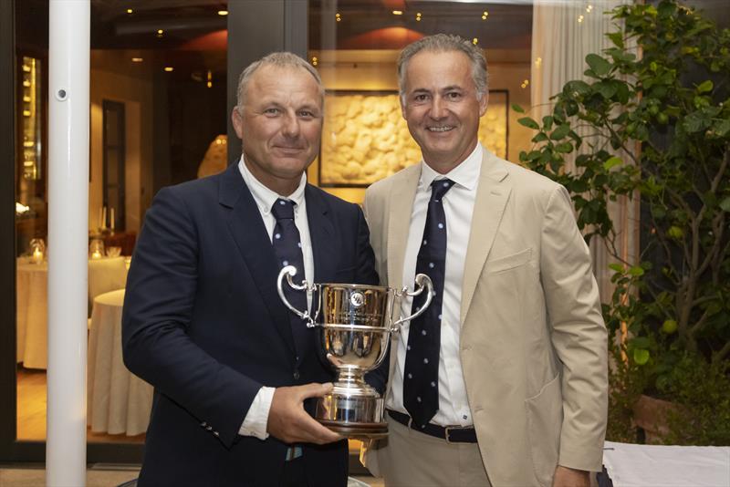 I Love Poland's skipper Grzegorz Baranowski is presented with the IMA Caribbean Maxi Challenge prize by IMA President Benoît de Froidmont photo copyright IMA / Studio Borlenghi taken at Yacht Club Costa Smeralda and featuring the Maxi class
