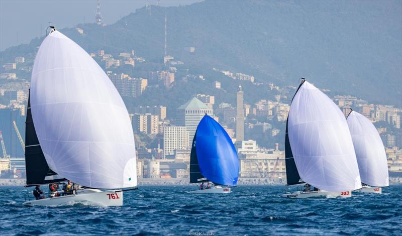 Melges 24 fleet sailing in front of La Lanterna at the Melges 24 European Championship 2022 in Genoa  photo copyright IM24CA / Zerogradinord taken at Yacht Club Italiano and featuring the Melges 24 class