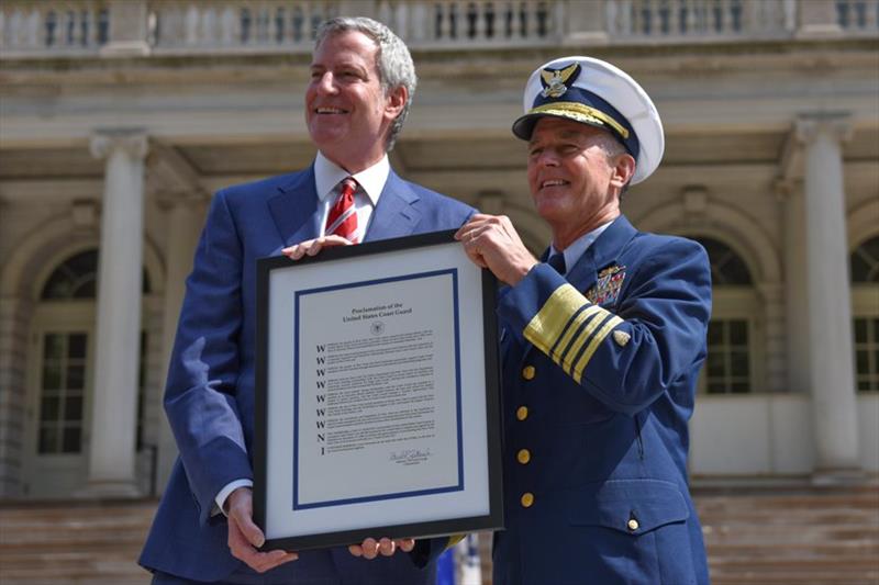 Adm. Paul Zukunft, Commandant of the Coast Guard, presents Bill de Blasio, Mayor of New York City, with a proclamation declaring New York as the newest Coast Guard City on May 10, 2018 photo copyright Steven Strohmaier, U.S. Coast Guard taken at 