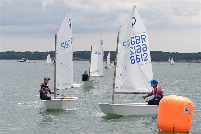 The Rogers brothers at the Lymington Optimist Open photo copyright Adam Gosling taken at Royal Lymington Yacht Club and featuring the Optimist class