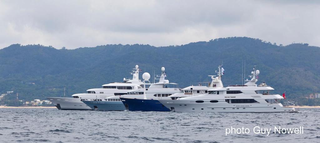 m/y line up - (l to r) Titania, Samax, Northern Sun, Moon Sand. Expect more superyachts to be chartering in Thailand soon. Asia Superyacht Rendezvous 2014 © Guy Nowell http://www.guynowell.com