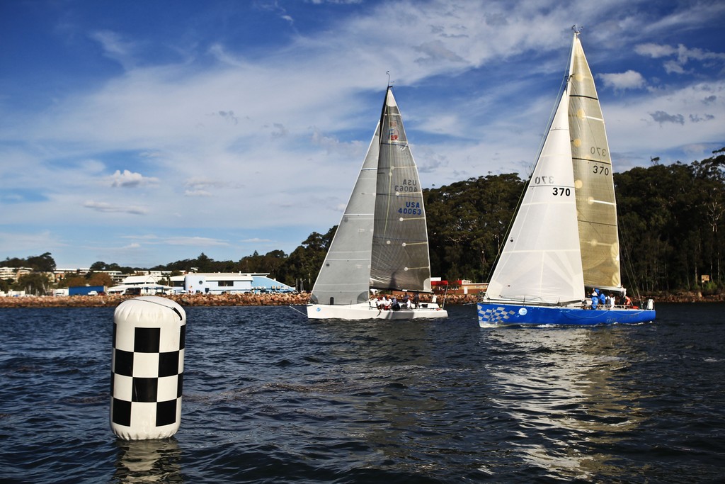 PT 73 (L) and She’s the Culprit (R) cross the finish line in the Performance Racing Class during 2012 Sail Port Stephens Regatta hosted by Corlette Point Sailing Club Day 5. Picture by Matt King Sail Port Stephens Media Event © Matt King /Sail Port Stephens 2012