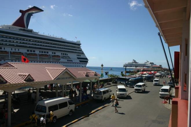 A warm welcome awaits from the taxi drivers and souvenir vendors at the Roseau Cruise Ship dock © Bluewater Cruising Association