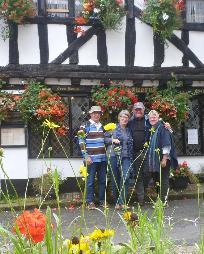 Jon, Pam, David and Kris. in front of a Medieval house believed to have been built around 1380 © SV Taipan