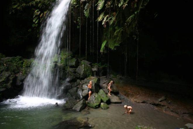 Family swim at the Emerald Falls in Dominica © Bluewater Cruising Association