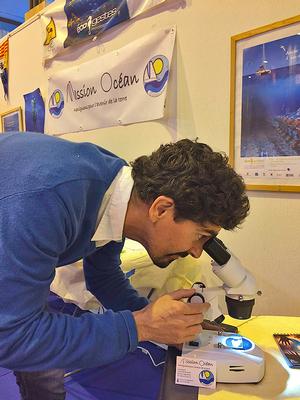 Henrique checking out the plankton samples photo copyright Mission Océan taken at  and featuring the  class