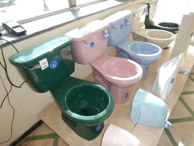 Brand new seatless toilets. © Ann Lange