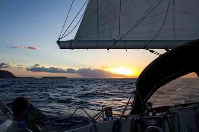 Huahine bound. Setting sails at sunset for our overnight passage. © Voyage of Te Mana