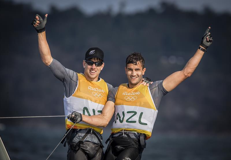 Peter Burling (L) and Blair Tuke (R)  celebrate winning Gold Medal in the Men's 49er Sailing, Rio2016 Olympic Games at Guanabara Bay, Rio de Janeiro photo copyright Sailing Energy taken at Iate Clube do Rio de Janeiro and featuring the 49er class