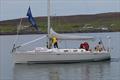 Serenity flying the Blue Ribbon after she crossed the line first at Lerwick at the end of leg 1 of the Bergen Shetland Race © Espen Sandøy