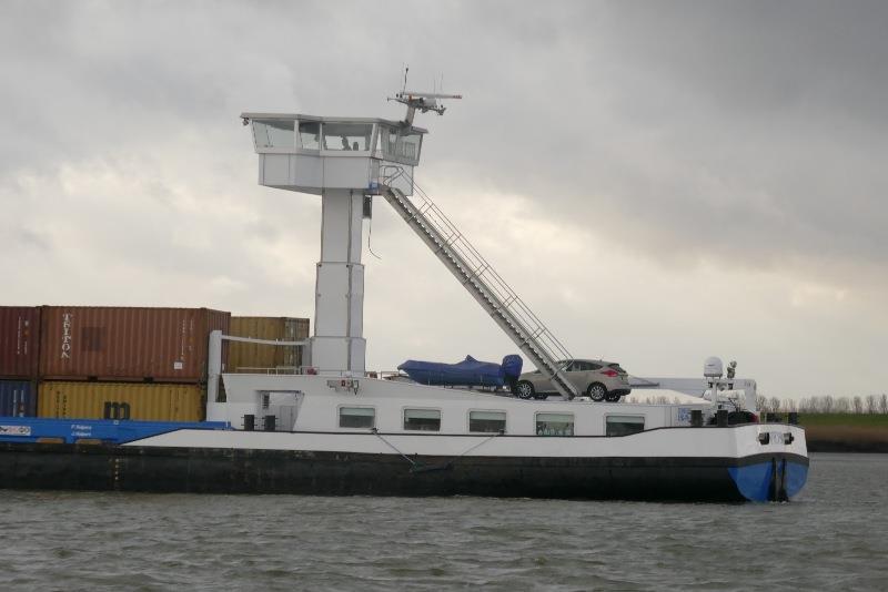 Canal barge with telescopic bridge. So he can pass under low bridges - photo © SV Taipan