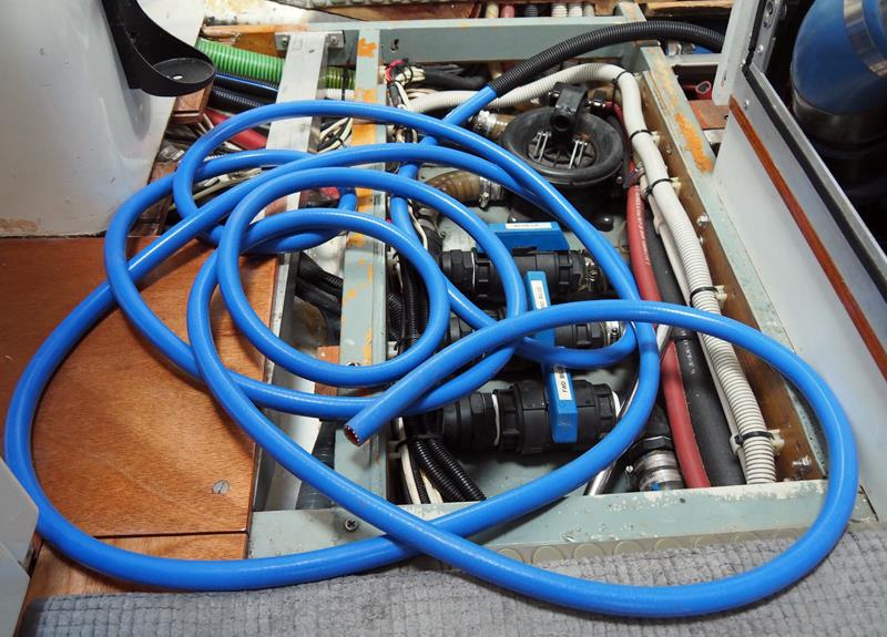 Heater Hose install photo copyright SV Crystal Blues taken at  and featuring the Cruising Yacht class