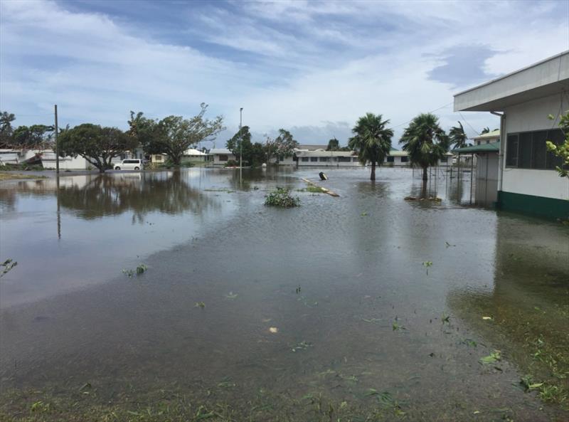 Tonga Police shared an image of their headquarters surrounded by water on Tuesday morning after heavy flooding caused by Cyclone Gita. The Category 4 storm is believed to be the most powerful cyclone to hit the island in recorded history photo copyright Tonga Police taken at  and featuring the Cruising Yacht class