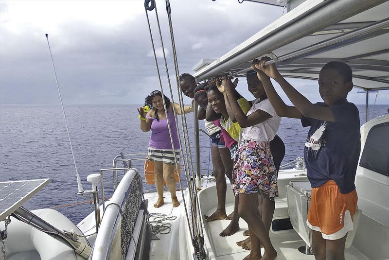 The kids and Sandra from Help for Dominica photo copyright Mission Ocean taken at  and featuring the Cruising Yacht class