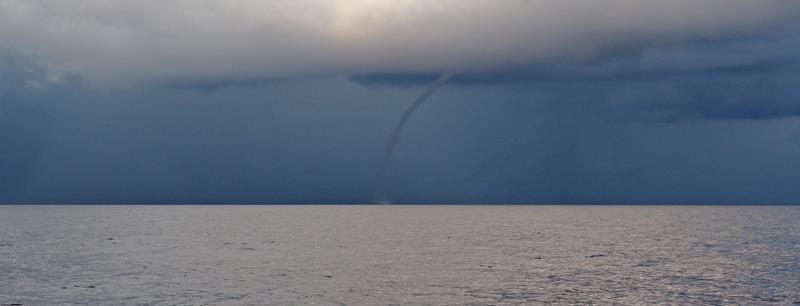 Waterspout on starboard - We last saw one of these in the South China Sea - photo © SV Crystal Blues
