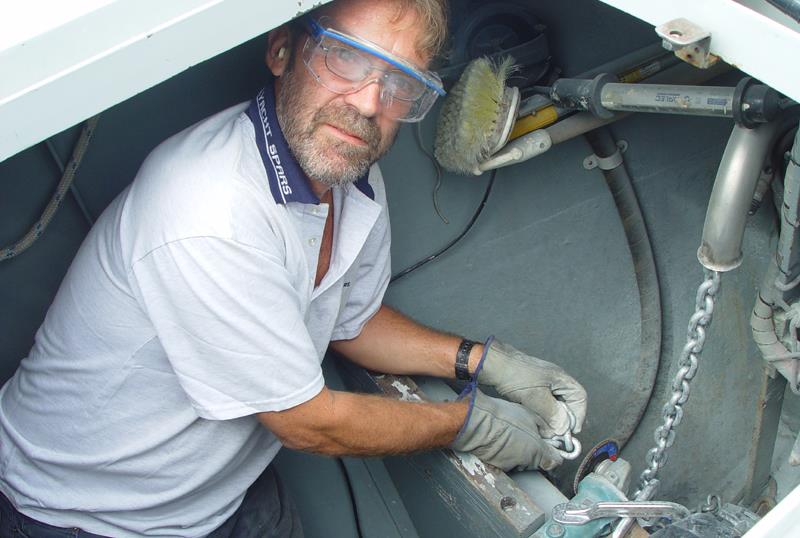 Grinding off the Zinc Dimples, one at a time photo copyright SV Crystal Blues taken at  and featuring the Cruising Yacht class