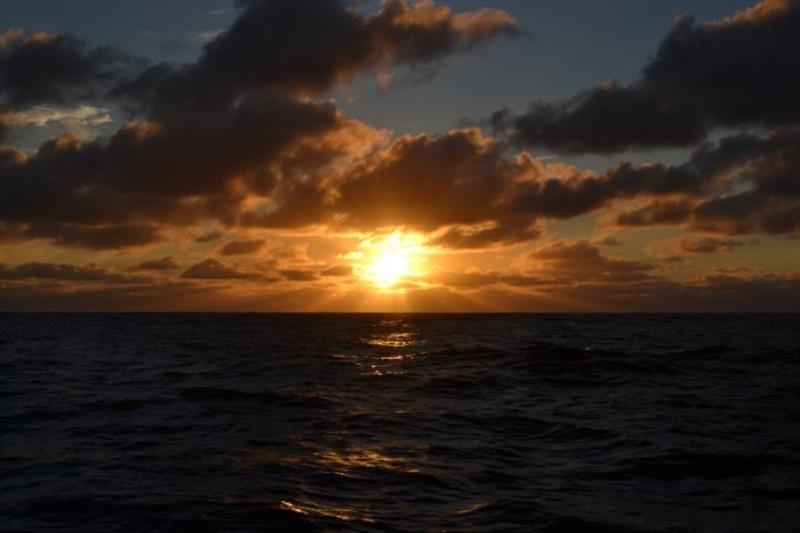 Sunset first night on Bay of Biscay photo copyright SV Red Roo taken at  and featuring the Cruising Yacht class