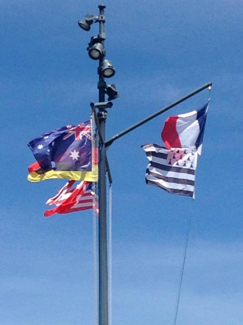 Australian Flag raised photo copyright SV Taipan taken at  and featuring the Cruising Yacht class