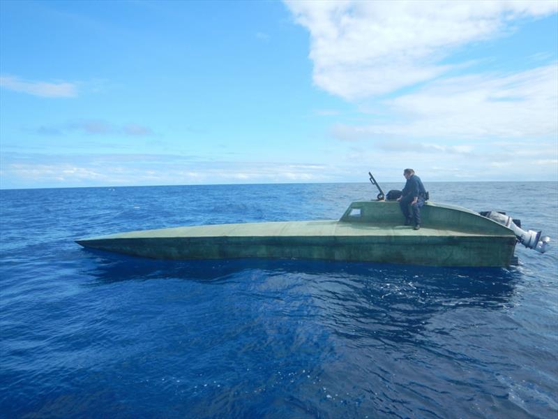 Crewmembers from U.S. Coast Guard Cutter Seneca inspect a suspected drug smuggling vessel in international waters of the Eastern Pacific Ocean Monday, August 20, 2018. - photo © U.S Coast Guard
