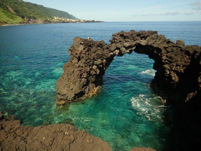 One of the many natural arches along the north side of the island of São Jorge, Açores. - photo © Rod Morris