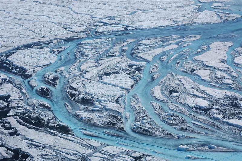 Large rivers form on the surface of Greenland each summer, rapidly moving meltwater from the ice sheet to the ocean photo copyright Sarah Das, Woods Hole Oceanographic Institution taken at  and featuring the Cruising Yacht class