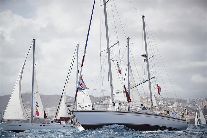 ARC  Rally yachts in the Cruising Division cross the line photo copyright World Cruising Club / James Mitchell taken at  and featuring the Cruising Yacht class