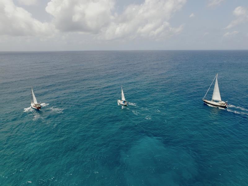 The vessels departing from Antigua (left to right) Nebula, Fathom and Balou, all UK registered and heading home photo copyright Caroline Dobbs taken at  and featuring the Cruising Yacht class