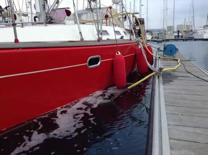 Pumping the water out of Red Roo - photo © Sailing Vessel Red Roo