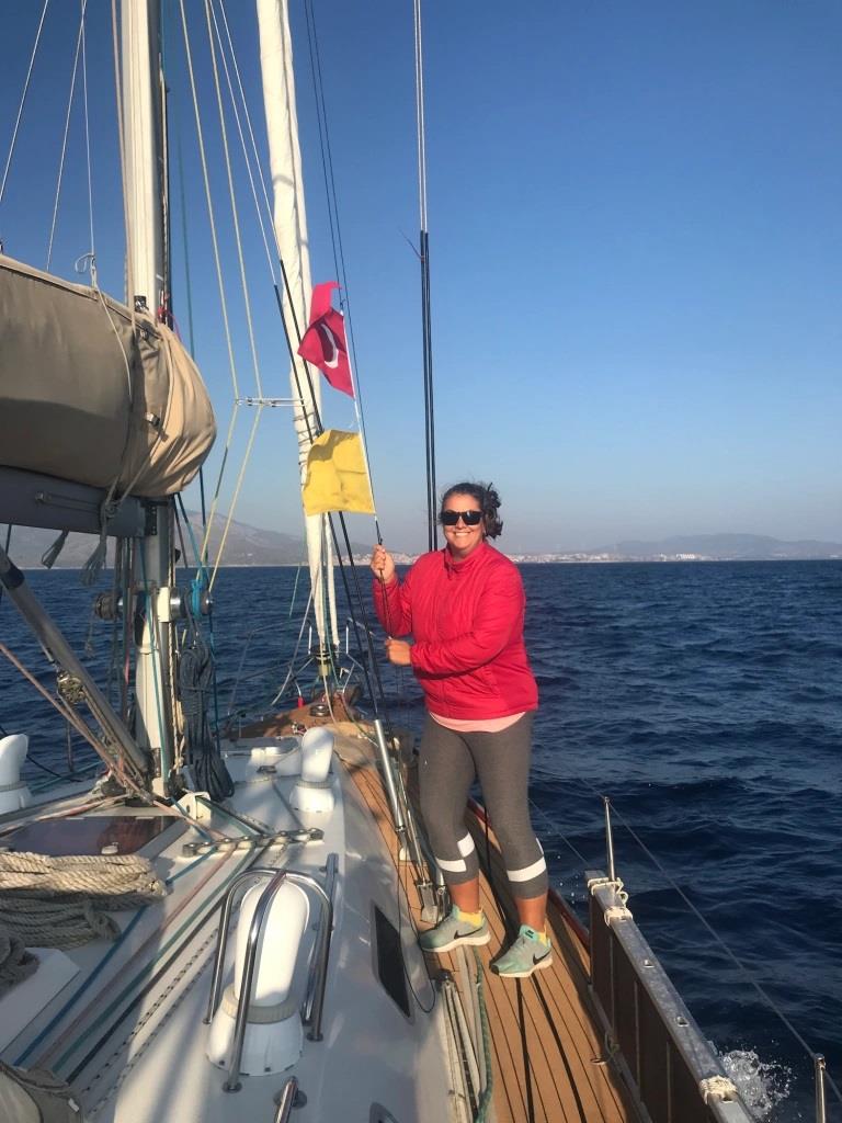Raising the courtesy flag as we enter Turkish waters photo copyright SV Red Roo taken at  and featuring the Cruising Yacht class