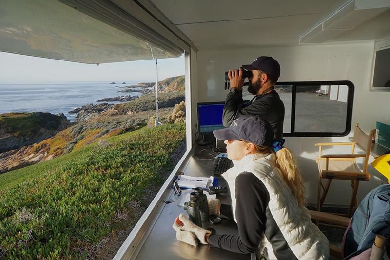 Observers on watch for gray whales at Granite Canyon study site - photo © NOAA Fisheries
