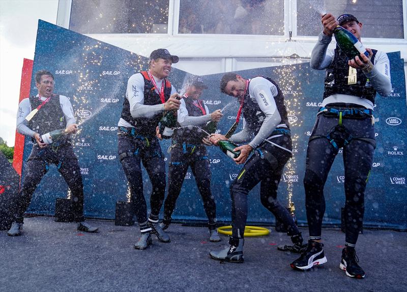 Australia SailGP Team helmed by Tom Slingsby spray Taittinger champagne on stage after winning Cowes SailGP.  - Cowes, Day 2, August 11, 2019 photo copyright Bob Martin for SailGP taken at  and featuring the F50 class