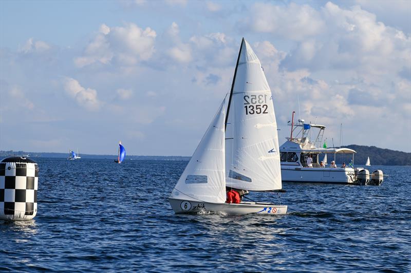 Aidan Nosworthy claims 1st place in R4 on Zhik Combined High Schools (CHS) Sailing Championships Day 2 photo copyright Red Hot Shotz Sports Photography / Chris Munro taken at Belmont 16ft Sailing Club and featuring the Flying 11 class