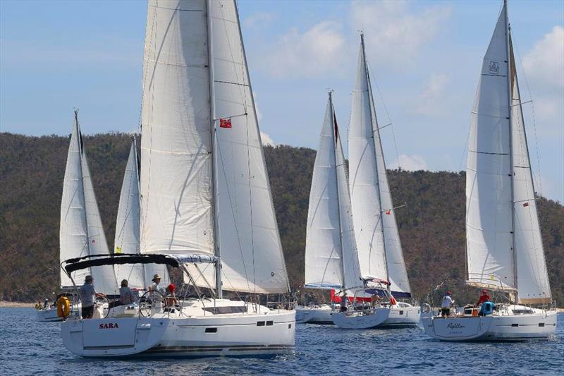 Sailing on courses between the islands, on the Caribbean Sea and Sir Francis Drake Channel keep the competitive bareboat fleet in the BVI Spring Regatta on their toes - Papillon far right photo copyright Ingrid Abery taken at Royal BVI Yacht Club and featuring the IRC class