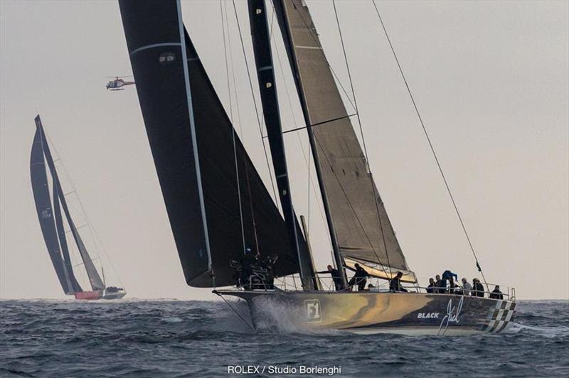 Black Jack leads Comanche as they close in on the 2018 Rolex Sydney Hobart finish line photo copyright ROLEX / Studio Borlenghi taken at Cruising Yacht Club of Australia and featuring the IRC class