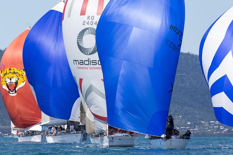 A spot of downwind competition at Airlie Beach Race Week photo copyright Andrea Francolini taken at Whitsunday Sailing Club and featuring the IRC class