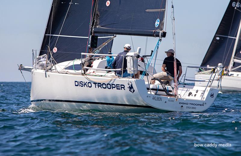 Disko Trooper leads the two handers out of the Harbour photo copyright Bow Caddy Media taken at Cruising Yacht Club of Australia and featuring the IRC class