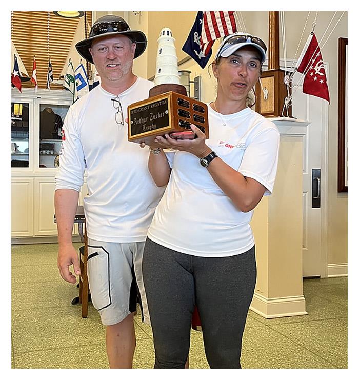 Photo of Pam Morris and Kevin Dakan of J/105 Warlock accepting the Arthur Zucker Perpetual Trophy at the Red Grant Regatta photo copyright J-Boats taken at Raritan Yacht Club and featuring the J105 class