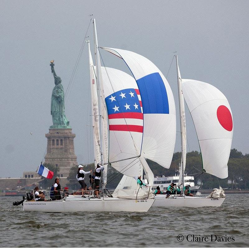 Thanks to Claire Davis for capturing this iconic picture of three of the Lady Liberty Regatta boats racing downwind under the gaze of the Statue of Liberty. You can tell the teams by their national spinnakers. This is France, Japan and the United States photo copyright Claire Davis taken at Manhattan Yacht Club and featuring the J/24 class