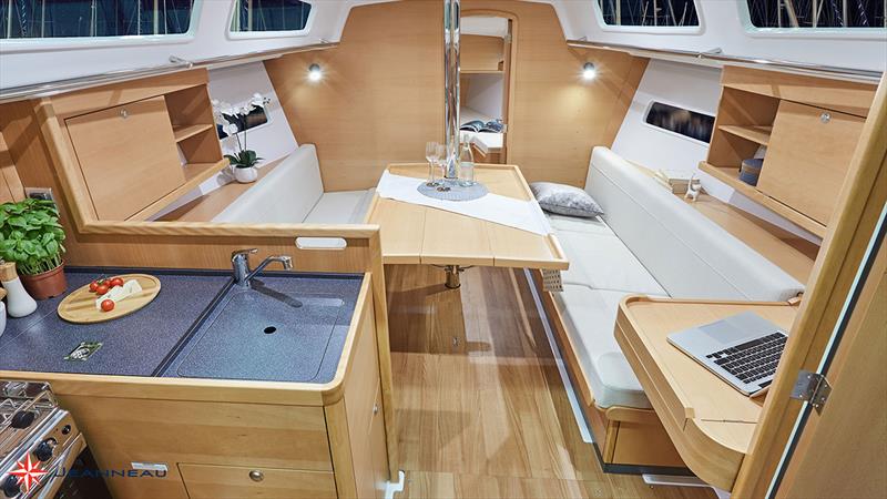 Jeanneau Sun Odyssey 319 - A generous interior with a comfortable galley and nav table photo copyright Jeanneau France taken at  and featuring the Jeanneau class