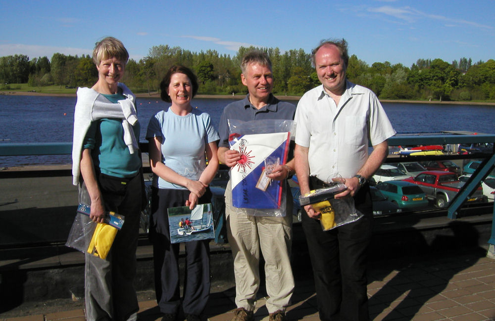Prize winners (left to right) Alma Cadzow, Margaret Galloway, Jim Galloway & Robert McCulloch at the Strathclyde Laser 2000 open photo copyright Laser 2000 class taken at Strathclyde Loch Sailing Club and featuring the 2000 class