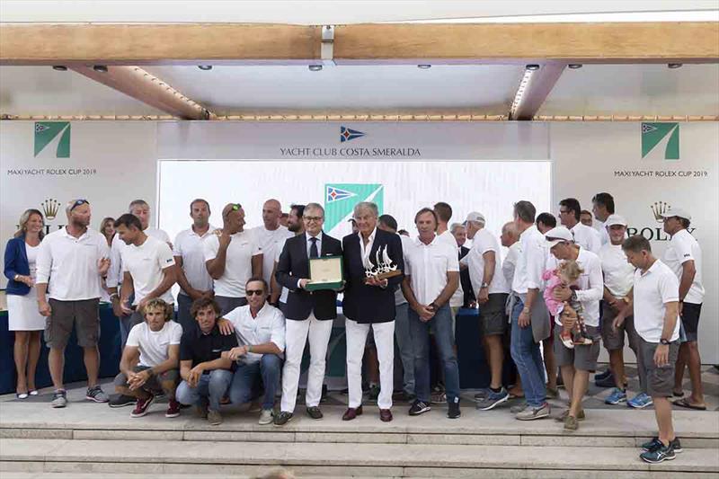 Ferrari and the Cannonball crew with their prizes including a Rolex timepiece photo copyright Studio Borlenghi  / International Maxi Association taken at Yacht Club Costa Smeralda and featuring the Maxi class