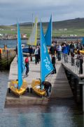 Young sailors from Lerwick Boating Club make ready to launch their boats from the new boat deck at Small Boat Harbour © Doug Allsop