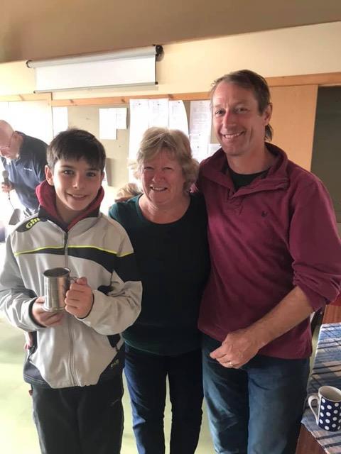 Tim and Christopher Hampshire, proud winners of the Admiral's Cup “Mariner Mug”, presented by Jacquie Tosh, wife of Club commodore Lindsay during the Solway Yacht Club Championship weekend photo copyright Anne-Marie Williams taken at Solway Yacht Club